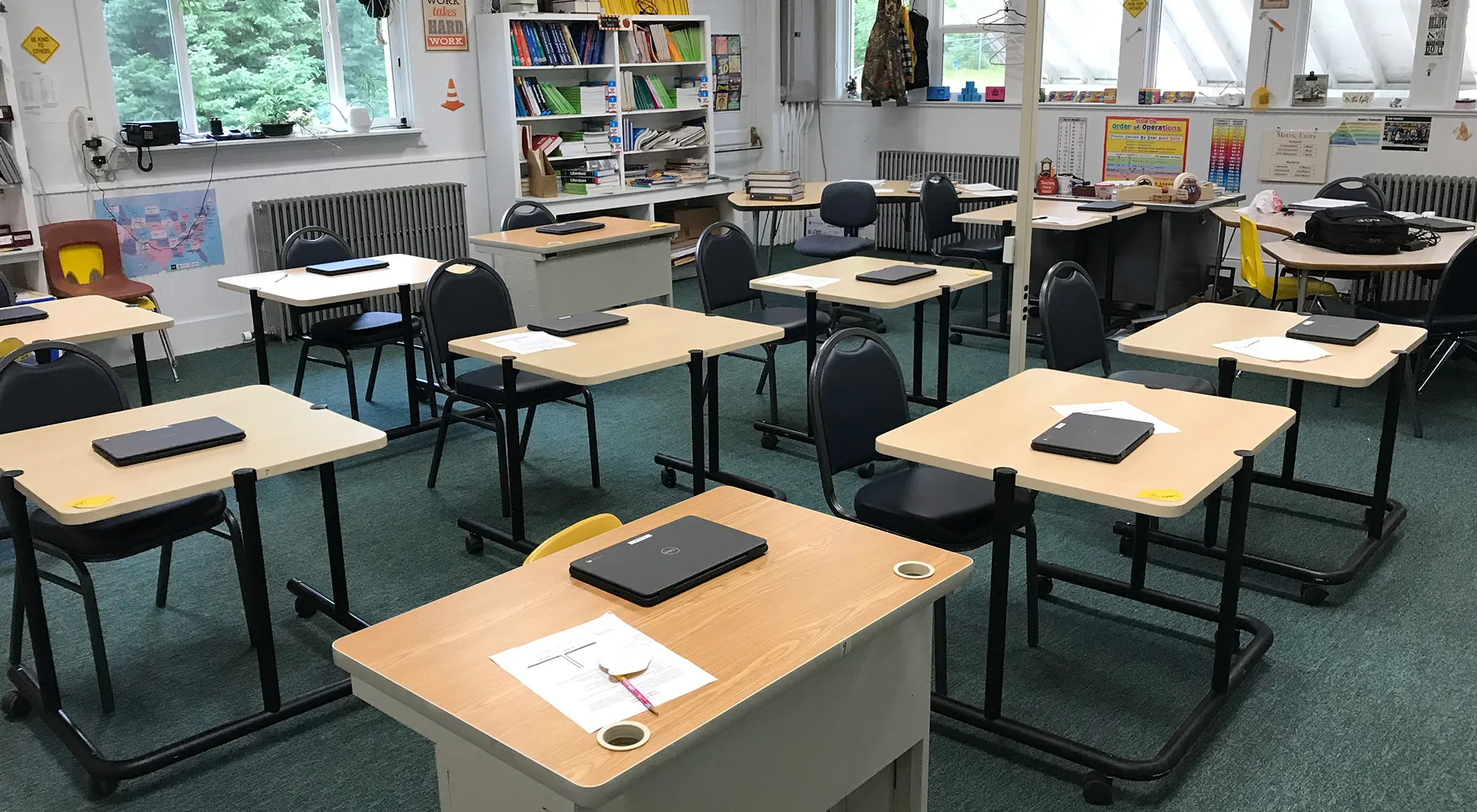 Laptops On Desk In Class