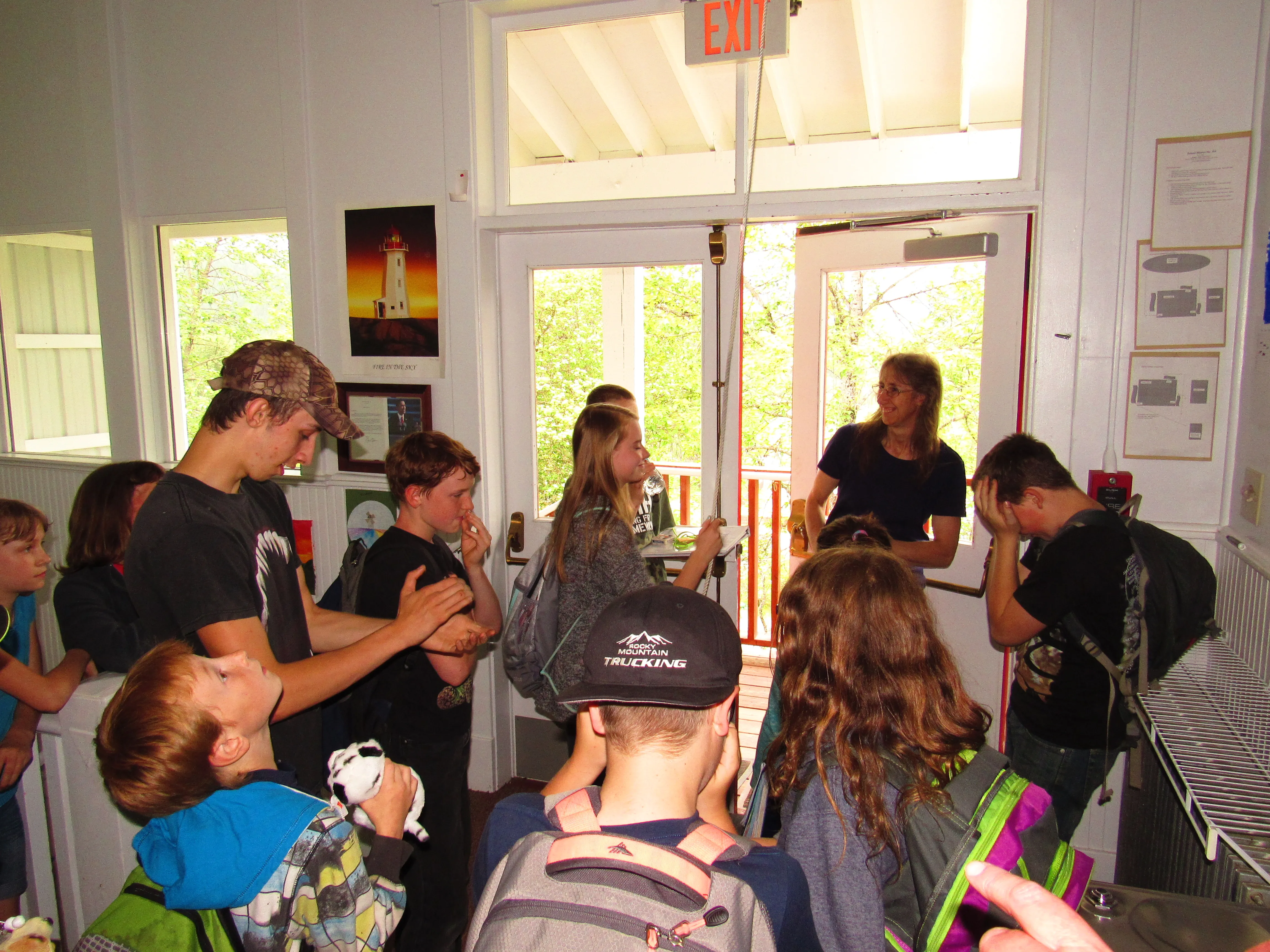 Students With Teacher Having Conversation